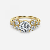 Round Cut Side Stone Engagement Ring