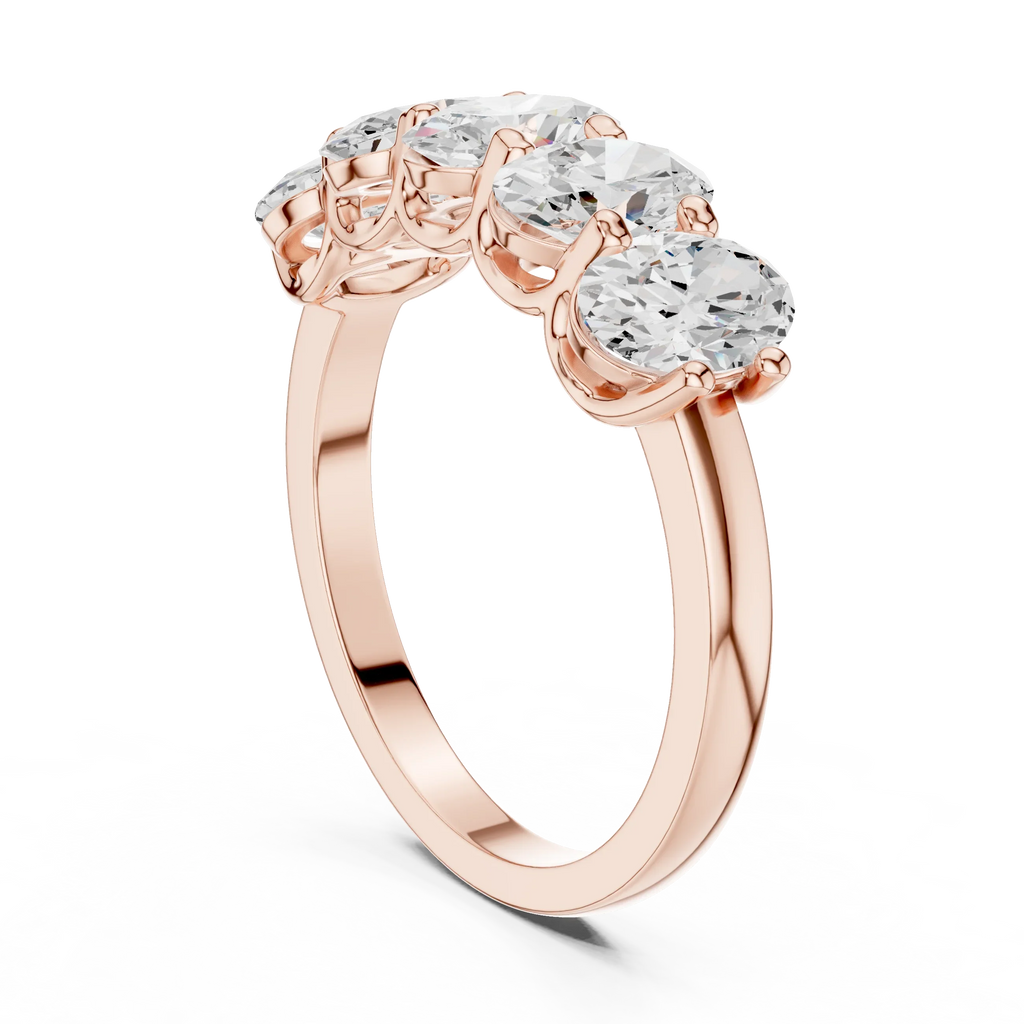 Five Stone Oval 0.21 CTW Rose 10K Gold VVS Moissanite Wedding Band