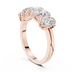 Five Stone Oval 0.21 CTW Rose 10K Gold VVS Moissanite Wedding Band