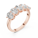 Five Stone Oval 0.21 CTW Rose 10K Gold VVS Moissanite Wedding Band