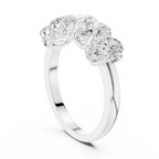 Five Stone Oval 0.21 CTW Rose 10K Gold VVS Moissanite Wedding Band