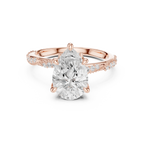 2.93 CTW Pear Cut Diamond Hidden Halo Twisted Pavé Engagement Ring in 14K Yellow Gold