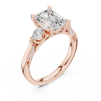 Emerald Cut Lab Grown 2.53 CT Three Stone Pear Accent Engagement Ring in 14K Rose Gold