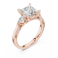 Princess Cut Lab Grown 2.53 CT Three Stone Pear Accent Engagement Ring in 14K Rose Gold