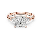Princess Cut Lab Grown 2.53 CT Three Stone Pear Accent Engagement Ring in 14K Rose Gold