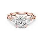 Round Cut Lab Grown 2.53 CT Three Stone Pear Accent Engagement Ring in 14K Rose Gold