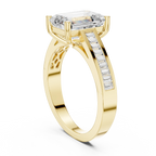 Emerald Cut Solitaire Engagement Ring with Baguette Channel Set Band in 14K Gold