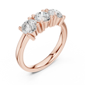 Round Brilliant Cut Moissanite Three-Stone Anniversary Ring in 18K Rose Gold