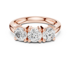 Round Brilliant Cut Moissanite Three-Stone Anniversary Ring in 18K Rose Gold