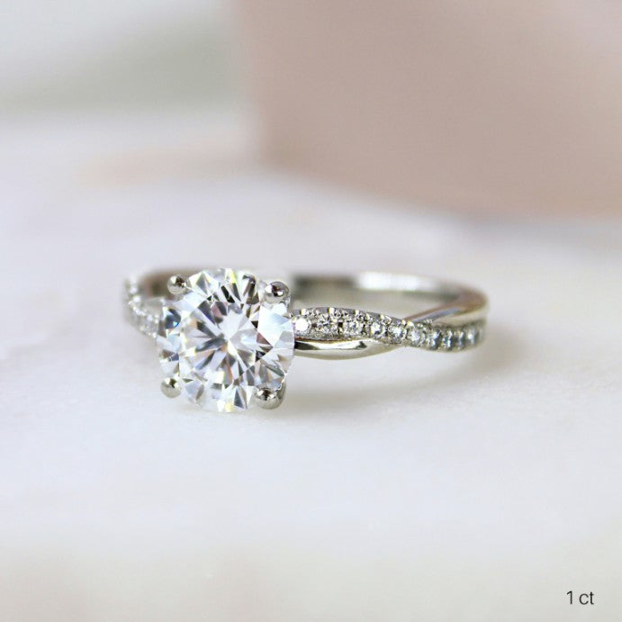 Round Cut Diamond Twist Engagement Ring