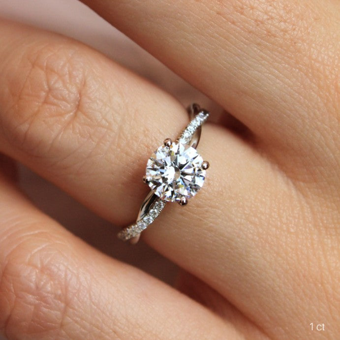 Round Cut Diamond Twist Engagement Ring
