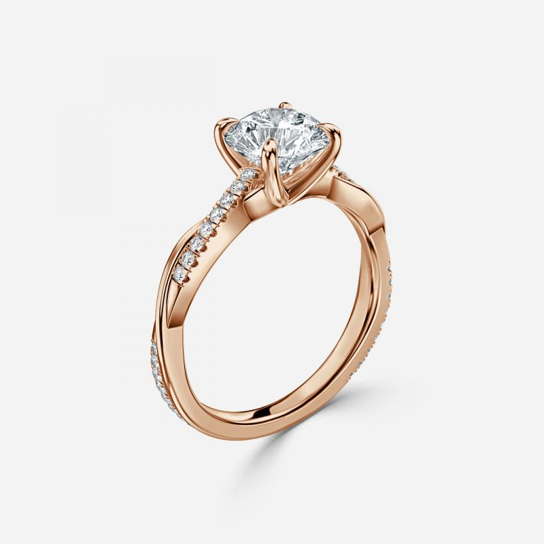 Round Cut Diamond Twist Engagement Ring