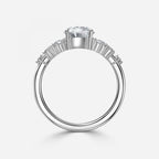 Round Cut Side Stone Engagement Ring