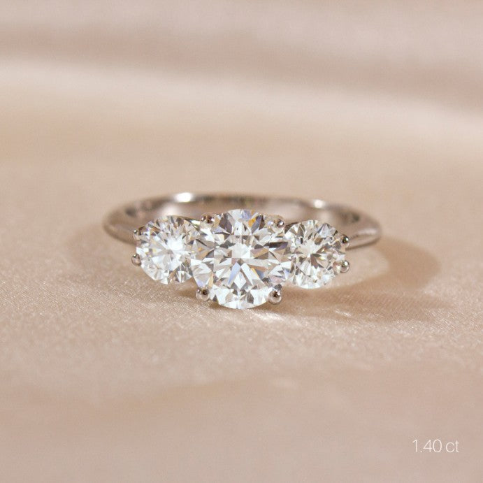 Round Cut Trilogy Engagement Ring