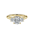 Round Cut Trilogy Engagement Ring