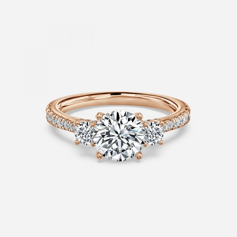 There Stone Round Diamond Engagement Ring