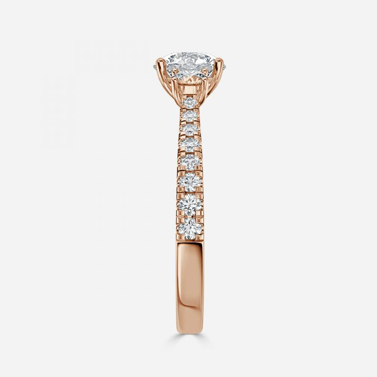 There Stone Round Diamond Engagement Ring
