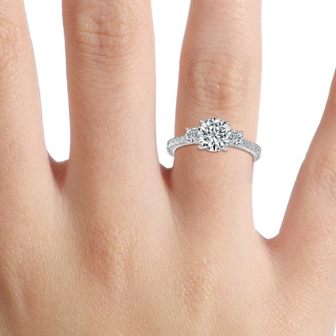 There Stone Round Diamond Engagement Ring