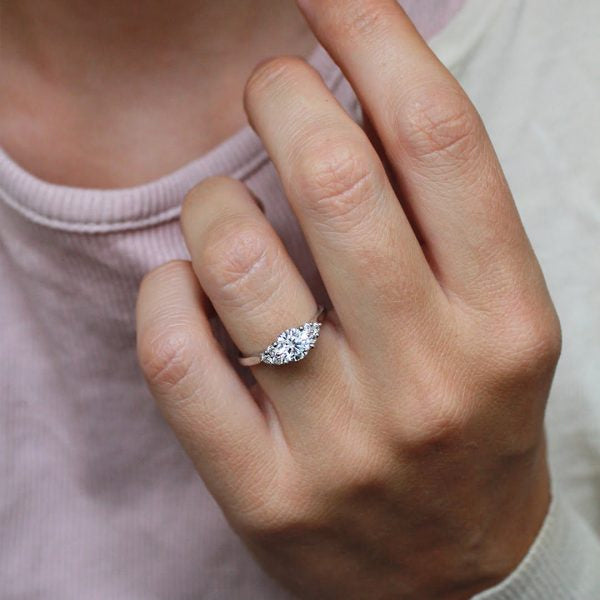 Round Cut Cluster Side Stone Engagement Ring