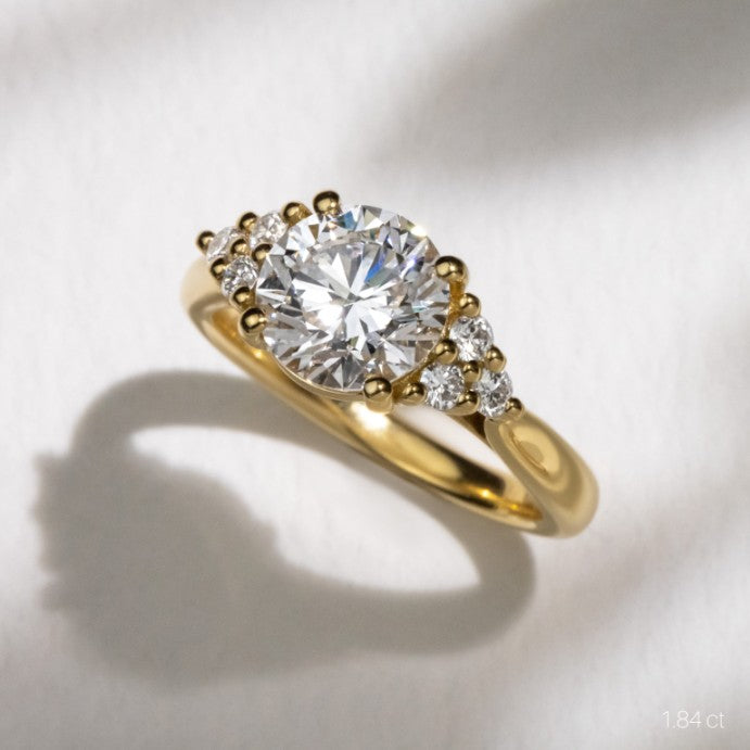 Round Cut Cluster Side Stone Engagement Ring